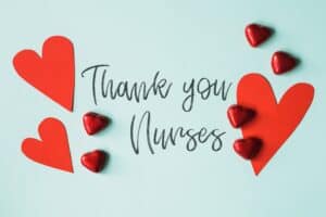 A card with “Thank you Nurses” in cursive, surrounded by red hearts and chocolates—perfect for Louisiana immigration lawyers to show appreciation.