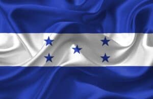 The flag of Honduras features three stripes and five blue stars in an X, like banners in a criminal defense lawyers Louisiana office.