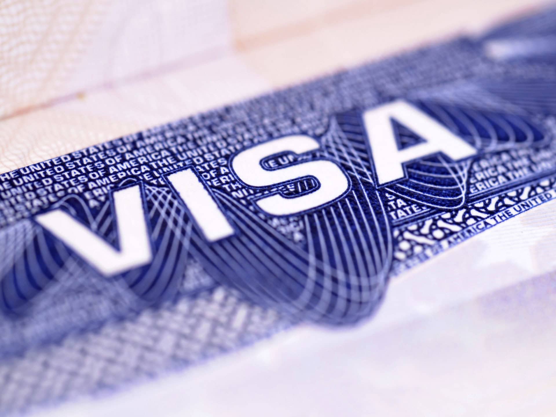 Close-up of a US visa document, ideal for louisiana immigration lawyers or a deportation law firm seeking legal imagery.