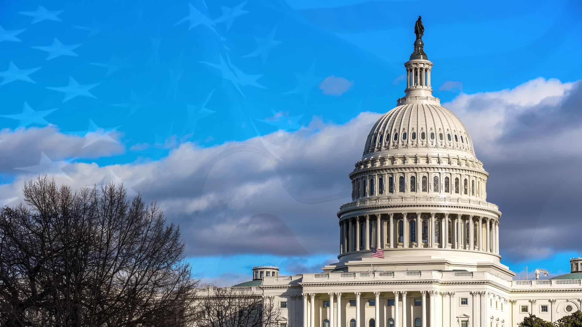 The United States Capitol under a blue sky, with clouds and bare trees—a symbol far from any Louisiana immigration lawyers’ office.